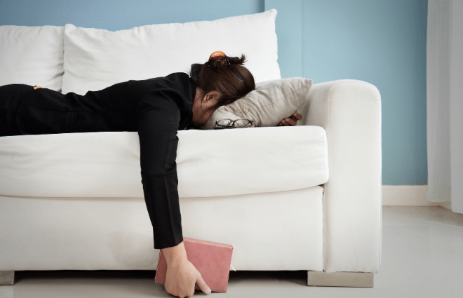 Tired Woman on Sofa