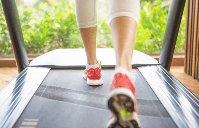 Woman walking on treadmill