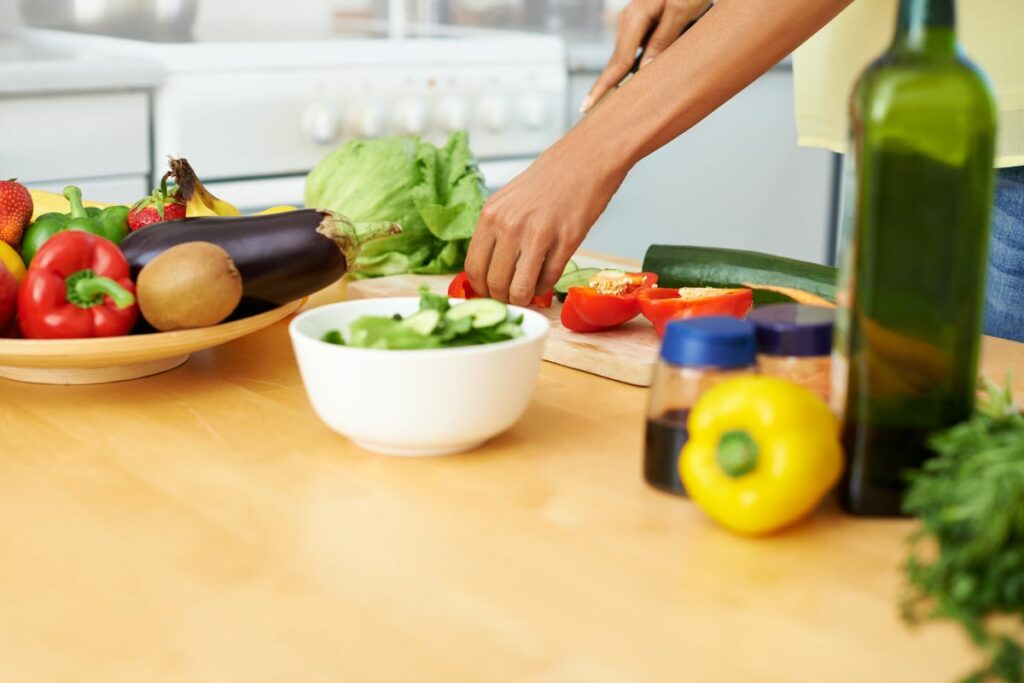 women love fast loss challenge prepping food in the kitchen